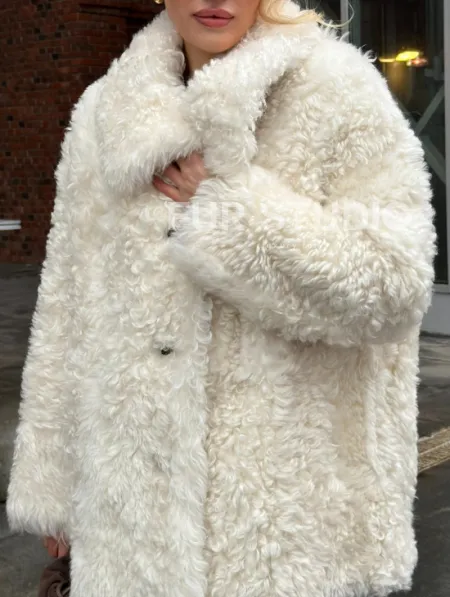 Белая шубка из тиградо - фото 4